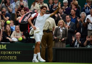 Switzerland's Roger Federer waves to the